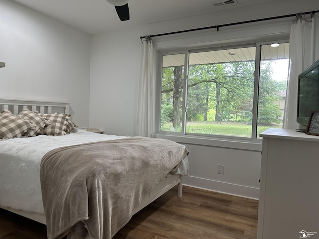 10931 Telegraph Rd, Erie, MI 48133 - bedroom featuring wood finished floors and ceiling fan