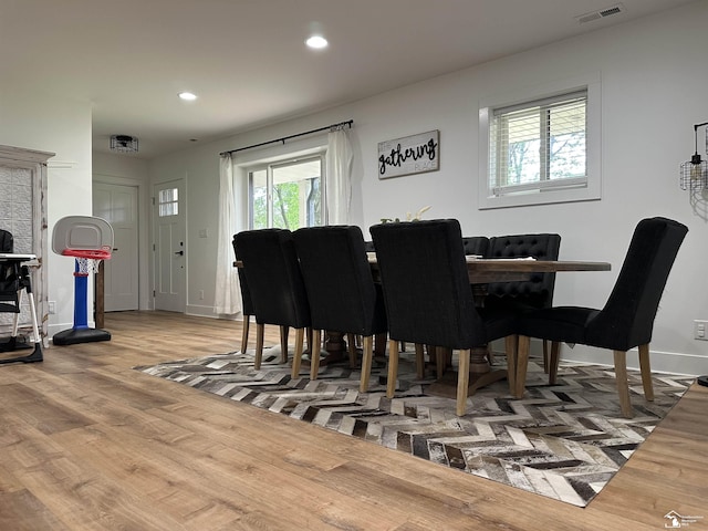 10931 Telegraph Rd, Erie, MI 48133 - dining room featuring recessed lighting and wood finished floors