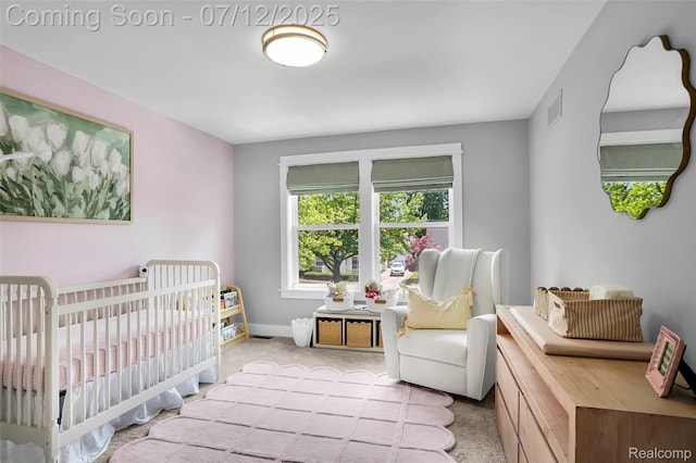 1212 Royal Ave, Royal Oak, MI 48073 - carpeted bedroom featuring a crib and baseboards