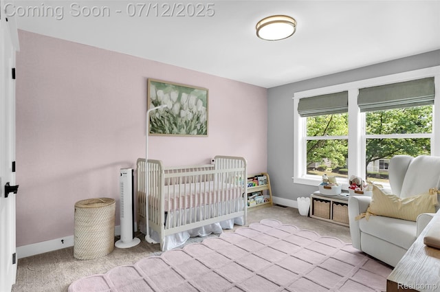 1212 Royal Ave, Royal Oak, MI 48073 - carpeted bedroom featuring baseboards and a crib
