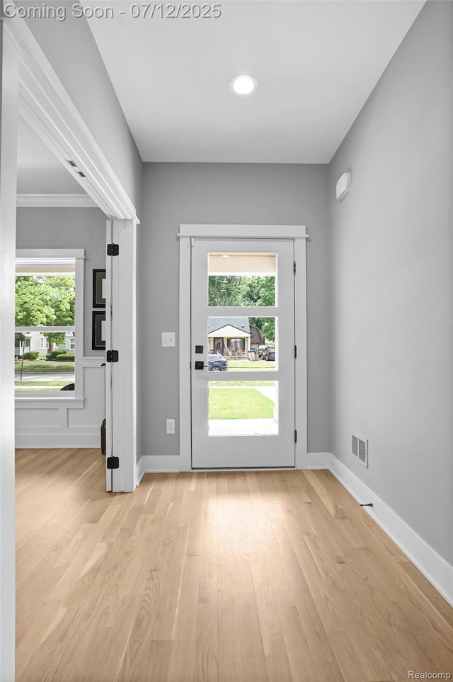 1212 Royal Ave, Royal Oak, MI 48073 - doorway featuring light wood-style floors, recessed lighting, and ornamental molding