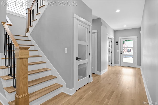 1212 Royal Ave, Royal Oak, MI 48073 - staircase with wood finished floors and recessed lighting