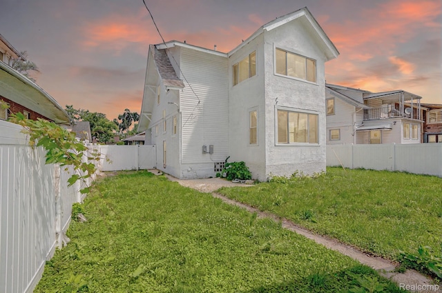 163 Moss St, Highland Park, MI 48203 - rear view of house with a fenced backyard
