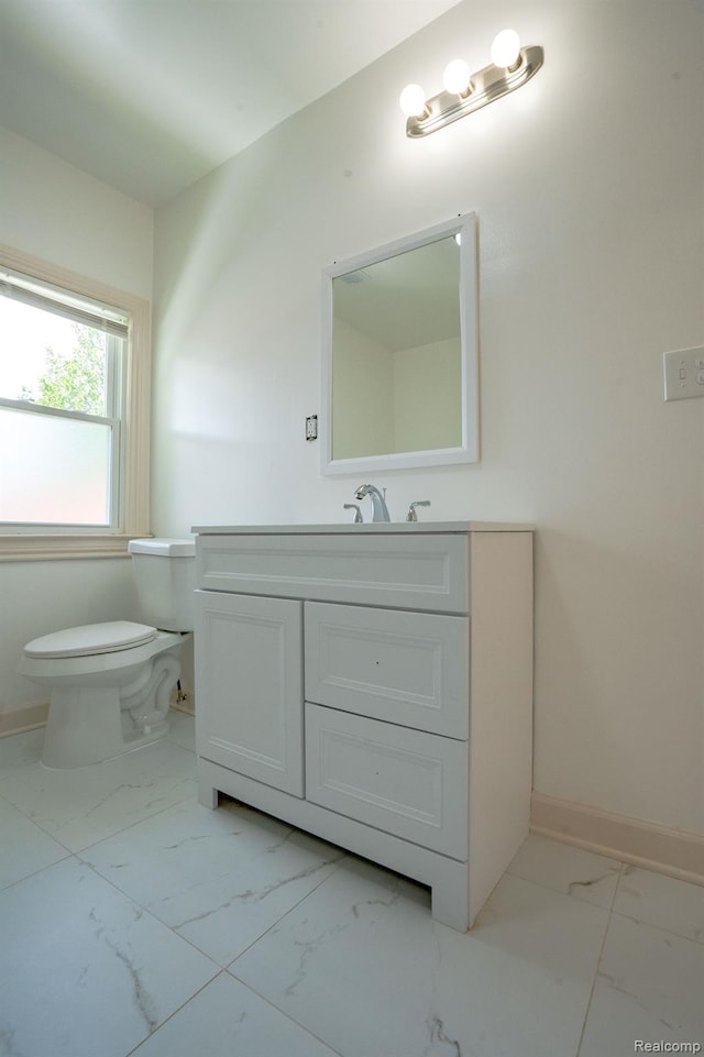 163 Moss St, Highland Park, MI 48203 - half bath featuring marble finish flooring and vanity