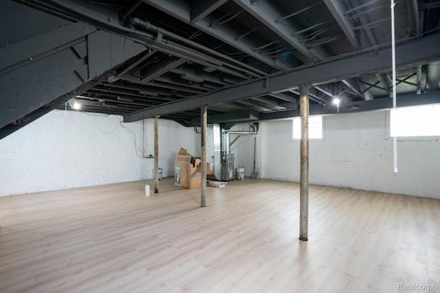 163 Moss St, Highland Park, MI 48203 - basement with wood finished floors