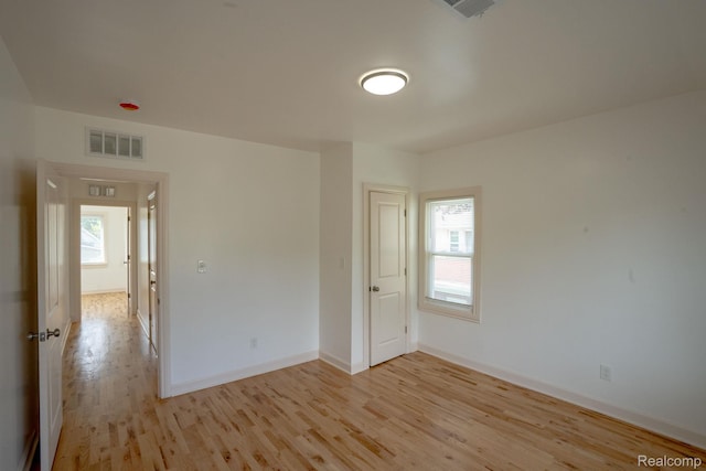 163 Moss St, Highland Park, MI 48203 - empty room featuring light wood-type flooring and baseboards