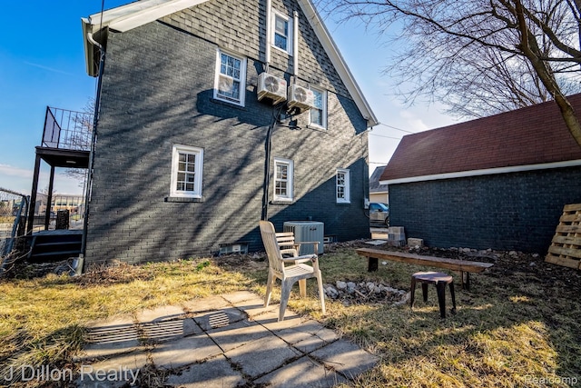 959 Washtenaw Rd, Ypsilanti, MI 48197 - rear view of property with brick siding