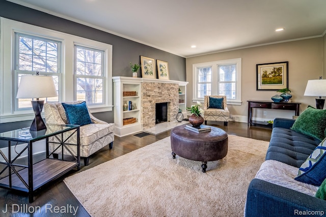 959 Washtenaw Rd, Ypsilanti, MI 48197 - living room featuring ornamental molding, dark wood-style floors, a fireplace, and recessed lighting