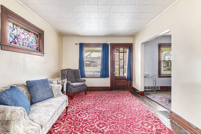 360 Burke St, River Rouge, MI 48218 - sitting room with ornamental molding, wood finished floors, and healthy amount of natural light