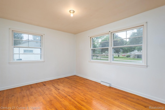 2548 Hearthside Dr, Ypsilanti, MI 48198 - unfurnished room featuring plenty of natural light and light wood-style floors