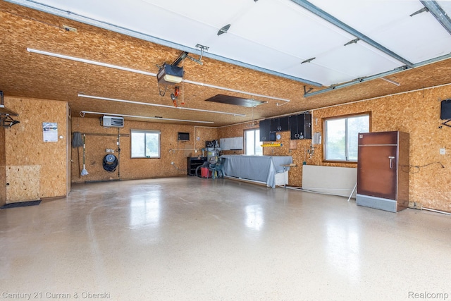 2548 Hearthside Dr, Ypsilanti, MI 48198 - garage featuring a garage door opener
