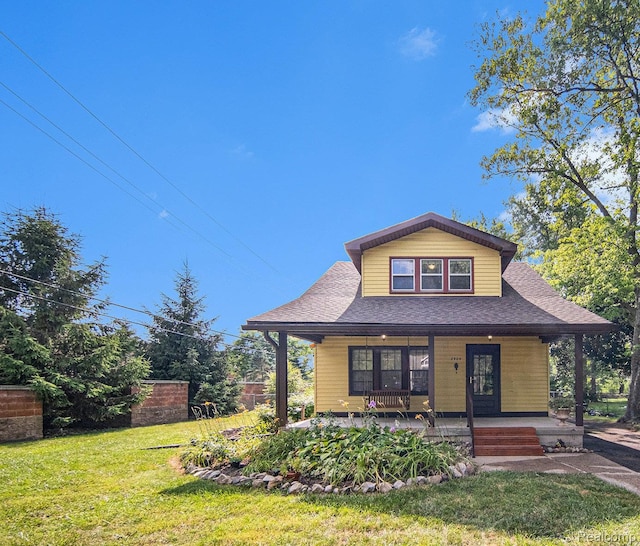 2904 Maplewood Ave, Ann Arbor, MI 48104 - bungalow-style home featuring a front lawn, a porch, and a shingled roof
