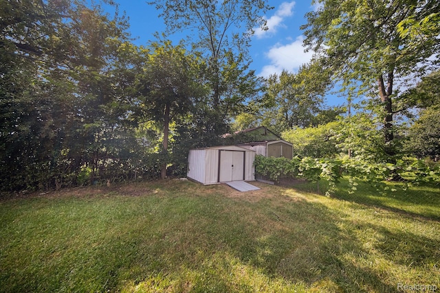 2904 Maplewood Ave, Ann Arbor, MI 48104 - view of green lawn with a storage shed