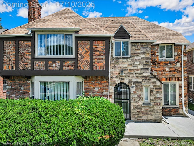 18024 Fairfield St, Redford, MI 48221 - view of front of property with a chimney, a balcony, and a shingled roof