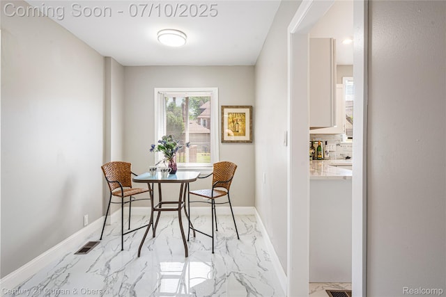 18024 Fairfield St, Redford, MI 48221 - dining area with light marble finish floors and baseboards