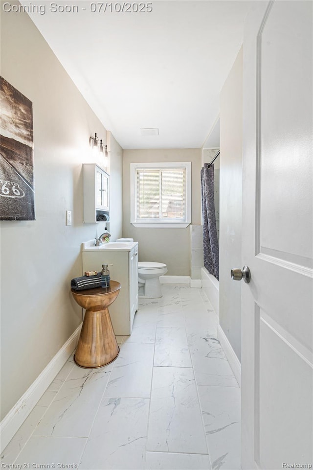 18024 Fairfield St, Redford, MI 48221 - full bath with marble look tiles, vanity, and shower / bath combination with curtain