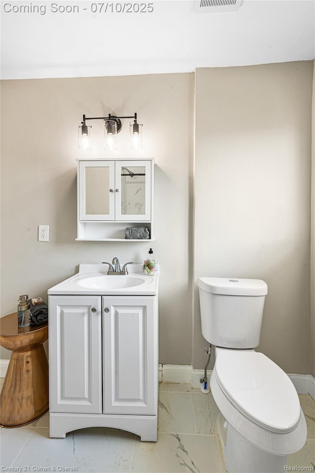 18024 Fairfield St, Redford, MI 48221 - half bathroom with marble look tiles and vanity