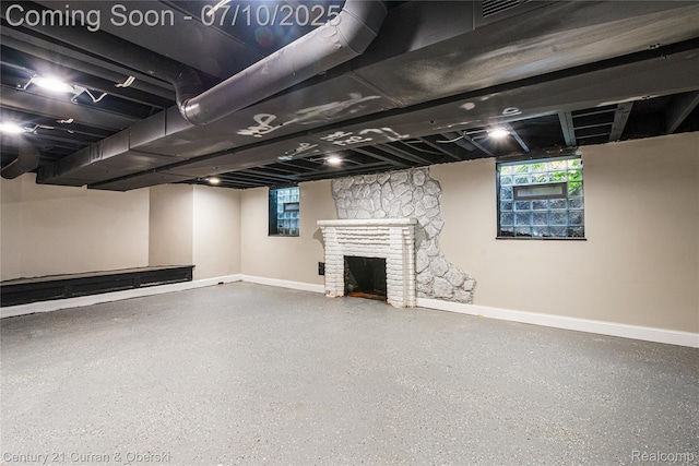18024 Fairfield St, Redford, MI 48221 - basement with baseboards and a fireplace