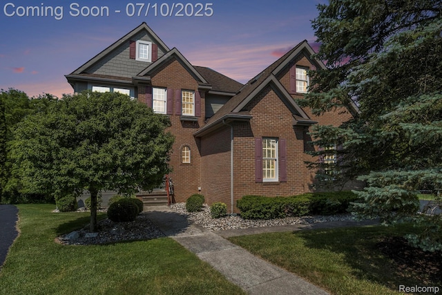 6161 Golfside Ct, Grand Blanc, MI 48439 - view of front of property featuring brick siding and a yard