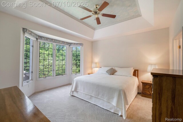 6161 Golfside Ct, Grand Blanc, MI 48439 - bedroom with carpet flooring, a raised ceiling, and a ceiling fan