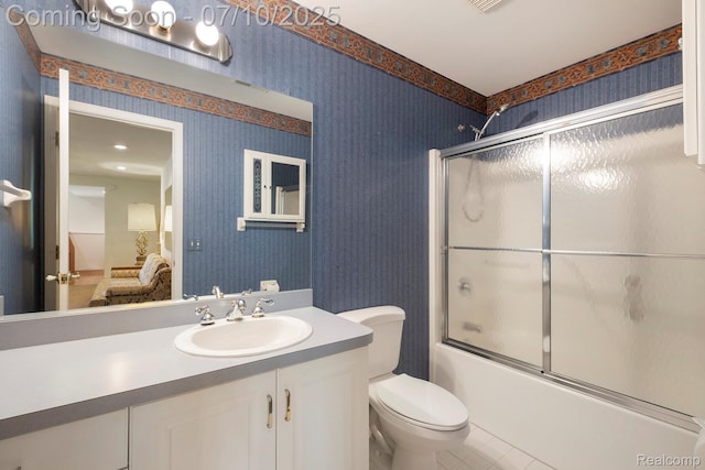 6161 Golfside Ct, Grand Blanc, MI 48439 - ensuite bathroom featuring wallpapered walls, bath / shower combo with glass door, vanity, and tile patterned flooring