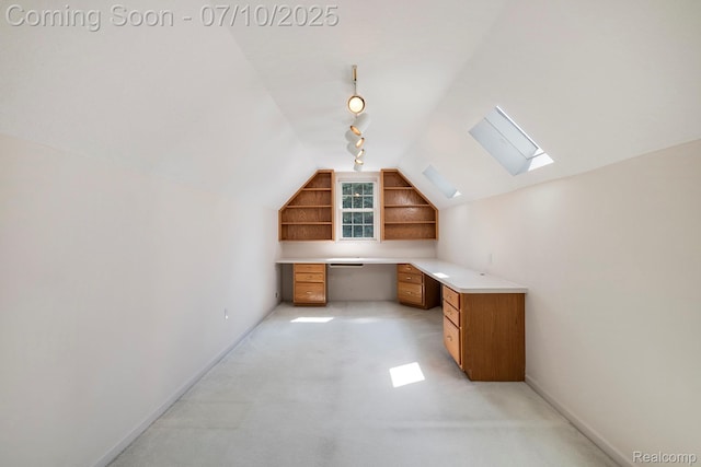 6161 Golfside Ct, Grand Blanc, MI 48439 - unfurnished office with lofted ceiling, a skylight, built in study area, built in shelves, and light colored carpet
