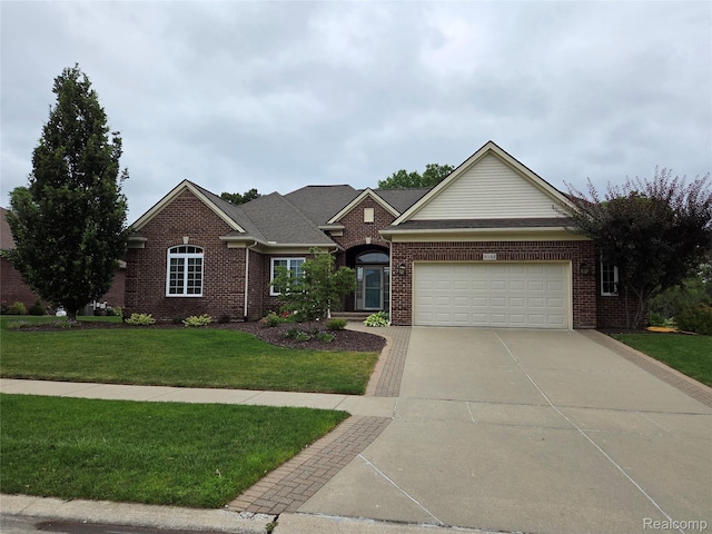 2181 E Shore Dr, Rochester Hills, MI 48307 - view of front of home featuring an attached garage, brick siding, concrete driveway, and a front yard