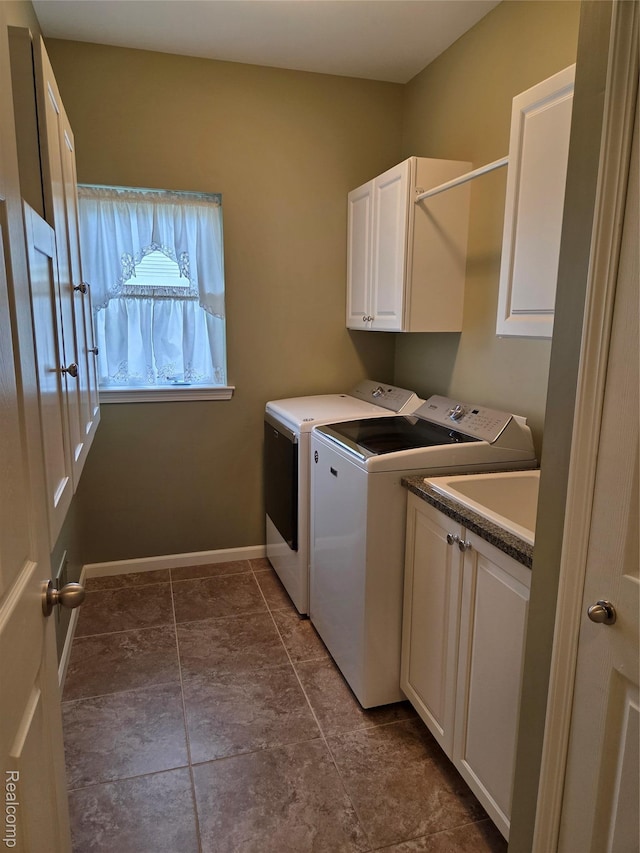2181 E Shore Dr, Rochester Hills, MI 48307 - laundry area with cabinet space and washing machine and clothes dryer