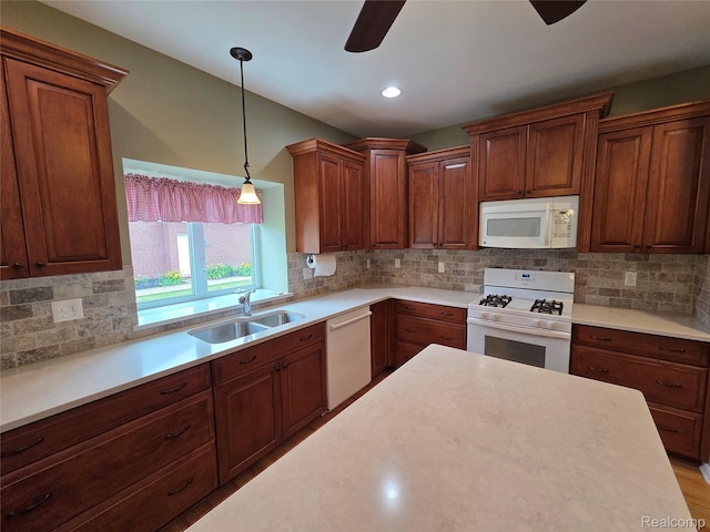 2181 E Shore Dr, Rochester Hills, MI 48307 - kitchen featuring white appliances, pendant lighting, light countertops, a ceiling fan, and recessed lighting