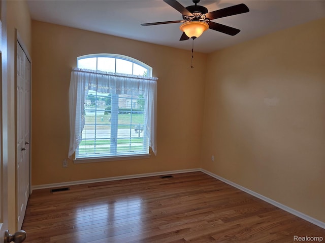 2181 E Shore Dr, Rochester Hills, MI 48307 - empty room with wood finished floors and a ceiling fan