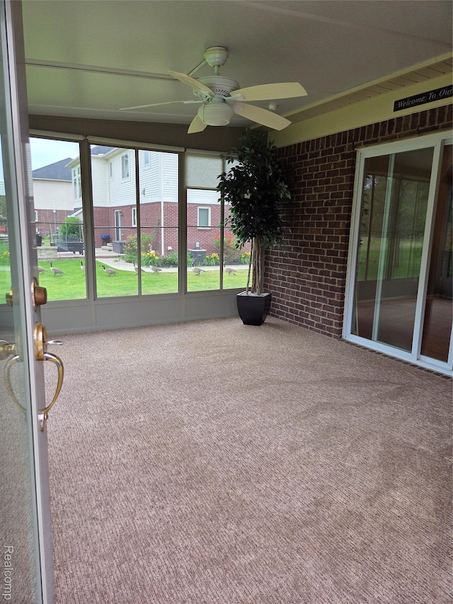 2181 E Shore Dr, Rochester Hills, MI 48307 - unfurnished sunroom with ceiling fan