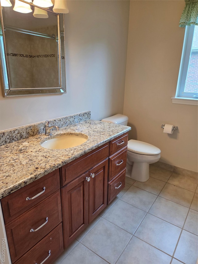 2181 E Shore Dr, Rochester Hills, MI 48307 - bathroom featuring vanity, tile patterned floors, and tiled shower