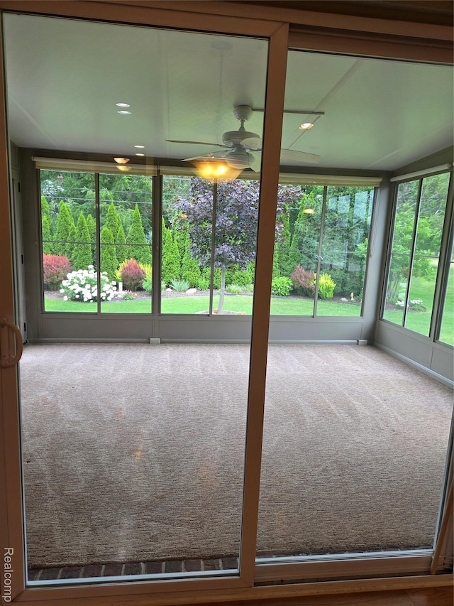 2181 E Shore Dr, Rochester Hills, MI 48307 - unfurnished sunroom featuring carpet floors