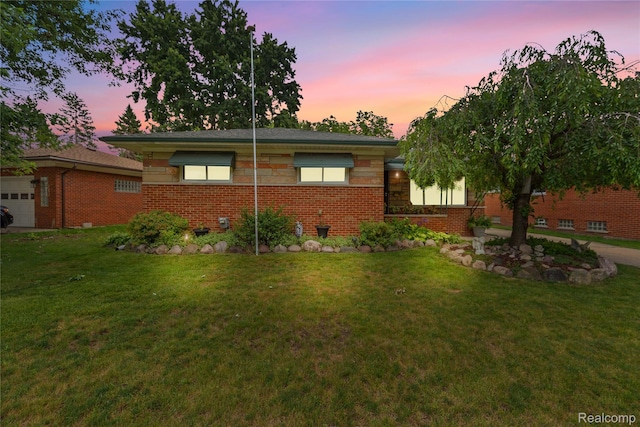 26714 Dover Ct, Warren, MI 48089 - ranch-style home with a lawn and brick siding