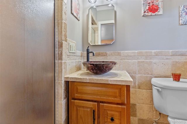 26714 Dover Ct, Warren, MI 48089 - bathroom with vanity, a shower stall, and wainscoting