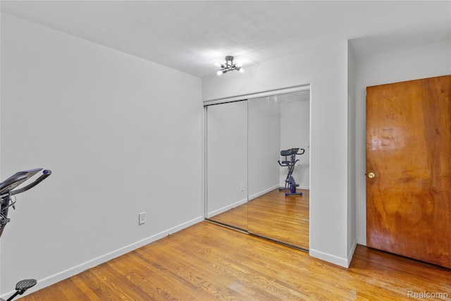 26714 Dover Ct, Warren, MI 48089 - unfurnished bedroom featuring light wood-style flooring and a closet
