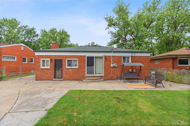26714 Dover Ct, Warren, MI 48089 - rear view of property with a patio area, entry steps, a chimney, and brick siding
