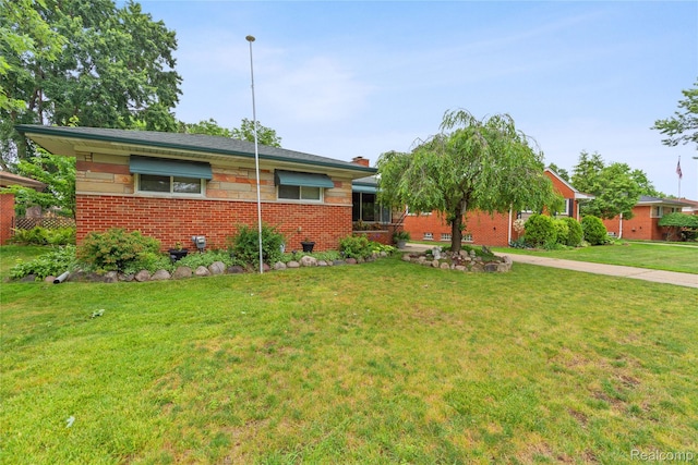26714 Dover Ct, Warren, MI 48089 - single story home with brick siding and a front yard