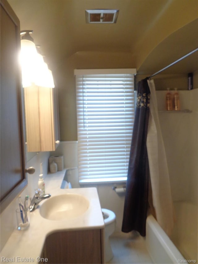 1353 N Gulley Rd, Dearborn Heights, MI 48127 - bathroom with shower / bath combo with shower curtain and vanity