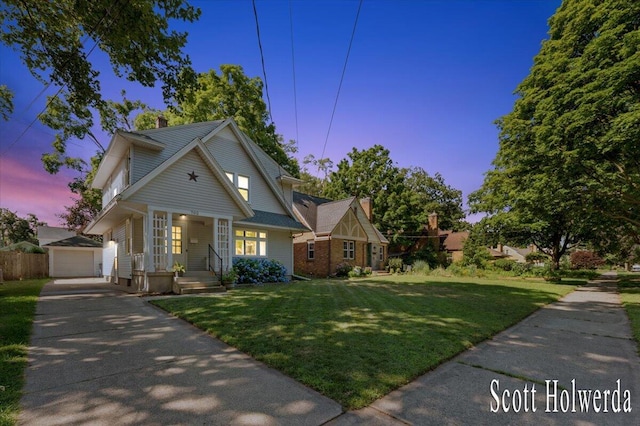 702 Griswold St SE, Grand Rapids, MI 49507 - traditional-style home featuring an outbuilding, driveway, a chimney, a porch, and a front yard