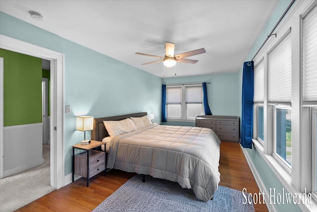 702 Griswold St SE, Grand Rapids, MI 49507 - bedroom featuring wood finished floors and a ceiling fan