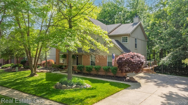 31085 Chatsford St, Novi, MI 48377 - view of property hidden behind natural elements with concrete driveway, a front lawn, a chimney, a shingled roof, and brick siding