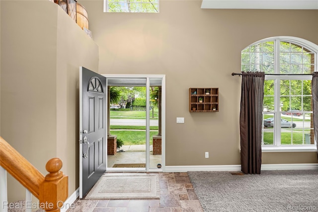 31085 Chatsford St, Novi, MI 48377 - entryway with plenty of natural light, stone finish flooring, and a high ceiling