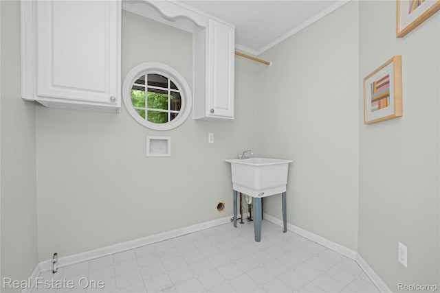 31085 Chatsford St, Novi, MI 48377 - laundry room with tile patterned floors, washer hookup, cabinet space, and crown molding