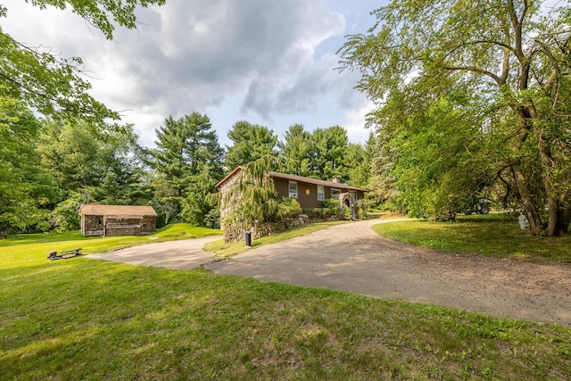 19744 Ivey Rd, Chelsea, MI 48118 - view of front of property featuring a front lawn and stone siding