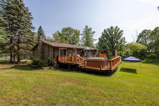 19744 Ivey Rd, Chelsea, MI 48118 - back of property featuring a deck, a yard, and a chimney