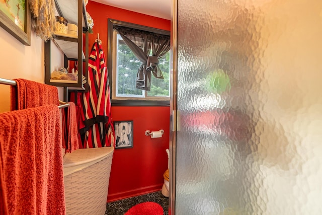 19744 Ivey Rd, Chelsea, MI 48118 - bathroom with toilet and an enclosed shower