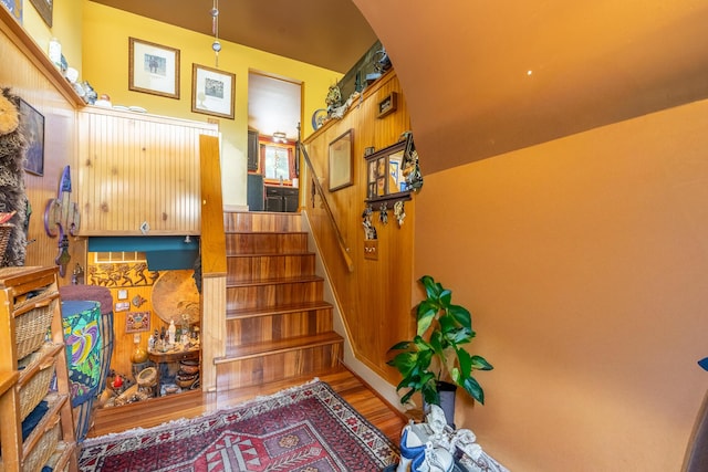 19744 Ivey Rd, Chelsea, MI 48118 - stairway with wood finished floors and arched walkways