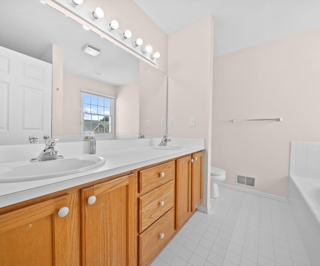 668 Boston Ct, Ann Arbor, MI 48103 - bathroom with double vanity, tile patterned flooring, and a garden tub