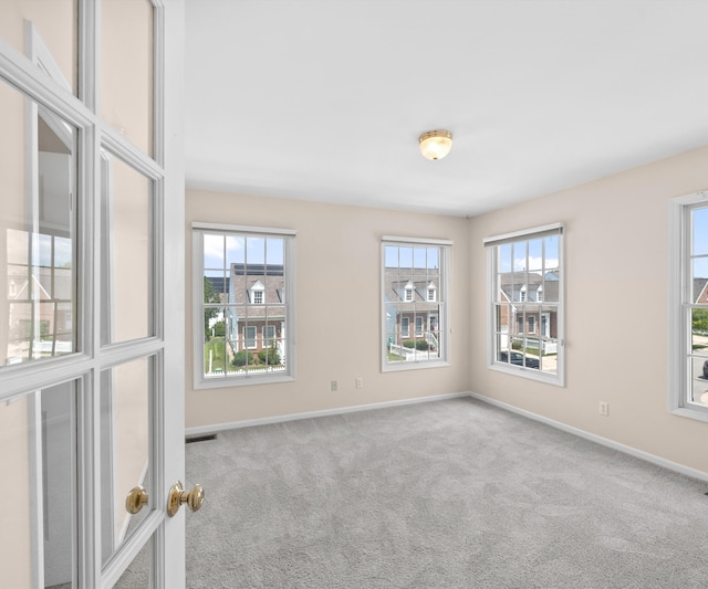 668 Boston Ct, Ann Arbor, MI 48103 - unfurnished room featuring carpet flooring and baseboards